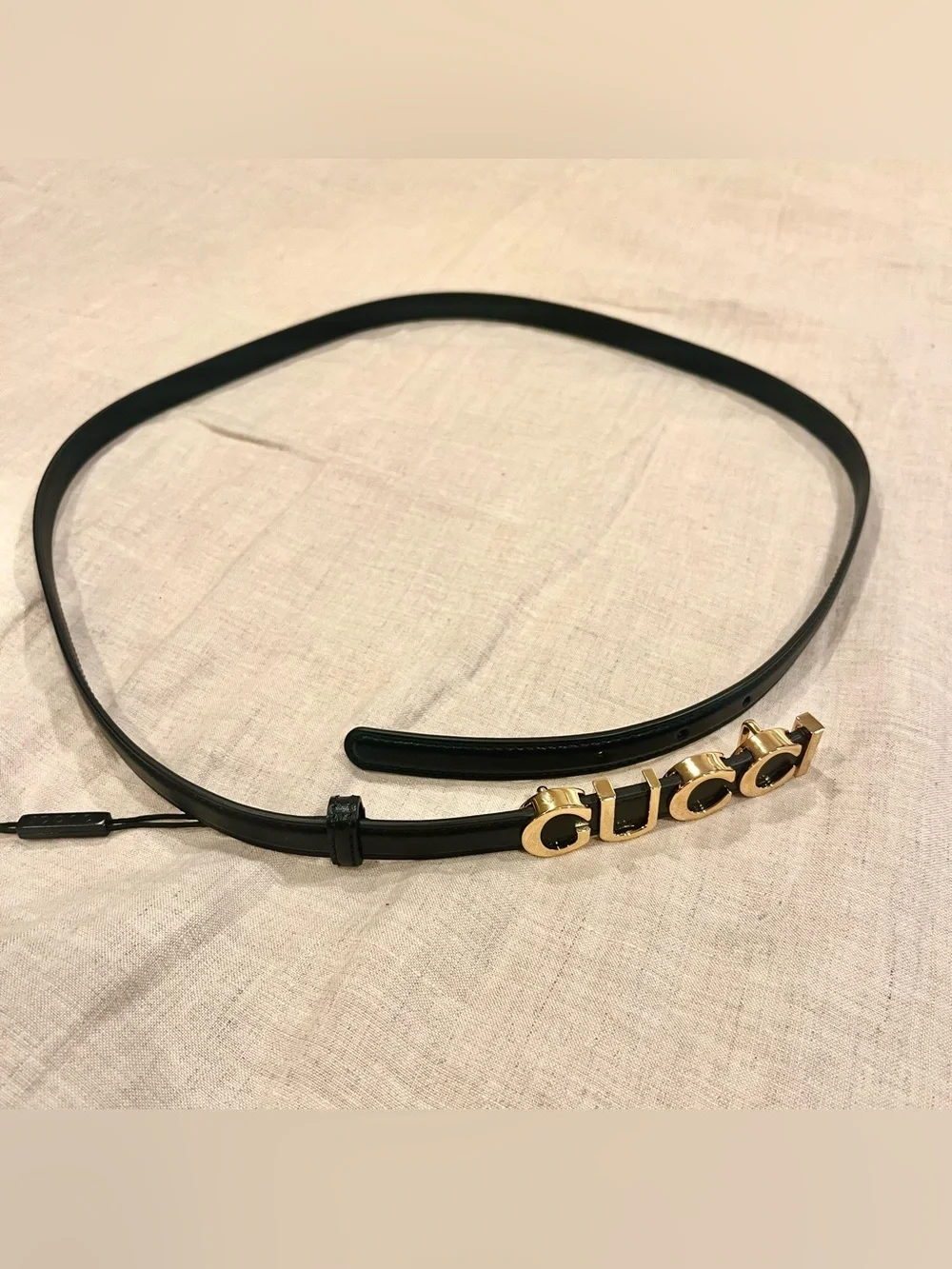 Gucci gold brand